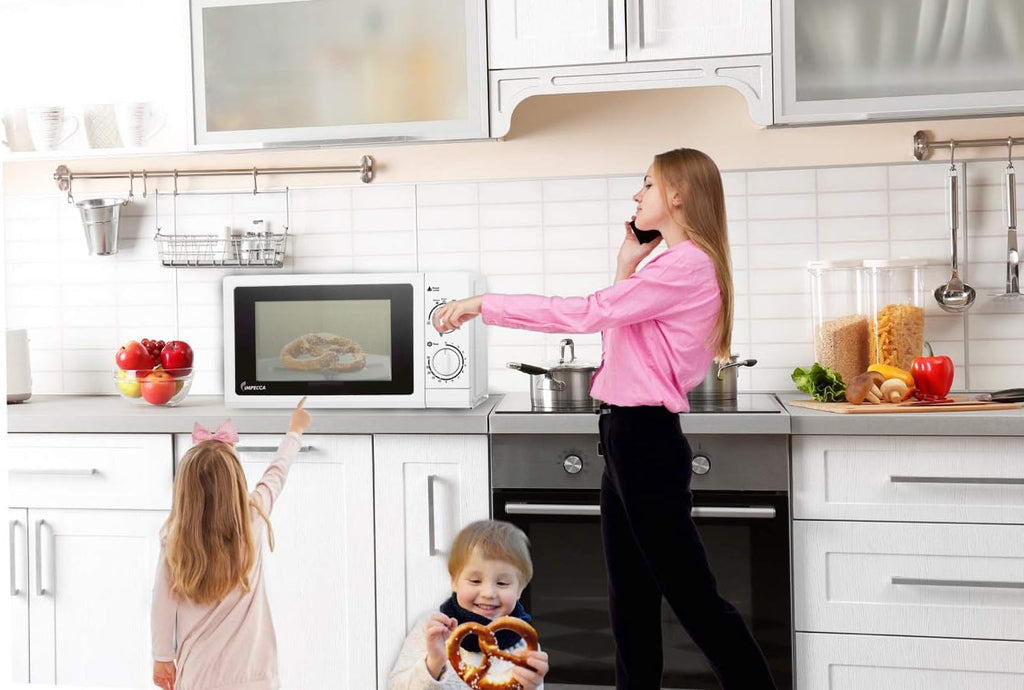 White 0.6 Cubic Feet Countertop Microwave Oven Q435